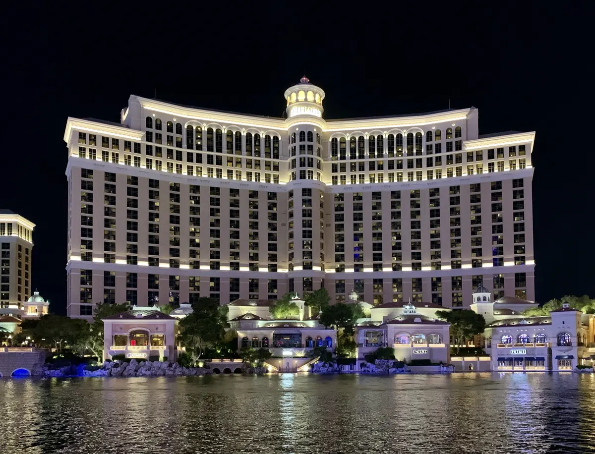 Bellagio illuminated across its lake at night, photographed in 2021