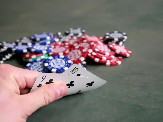 Reference photograph of playing cards and poker chips